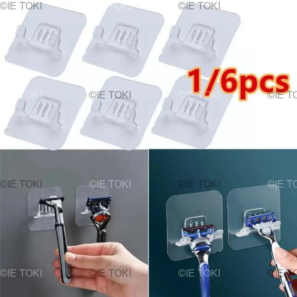 説明: 製品名: トイレ手動かみそりラック 材料: PVC Color: 透明な色 製品サイズ: 6*6cm 目的: 収納かみそり 仕様: 1.穴あけの必要がなく、壁にダメージがありません 2.インス
